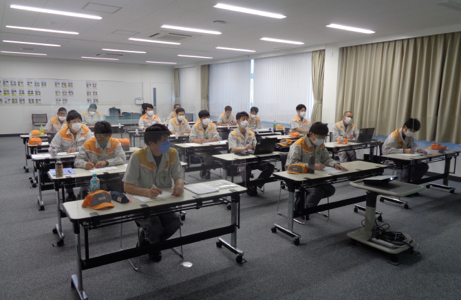 Employees receiving a lecture at an Anzen Dojo