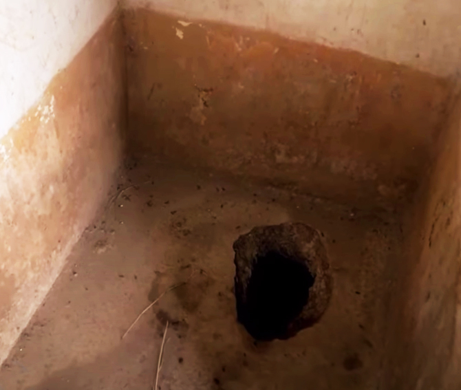 Example of pit latrine at a primary school in Kenya before SATO toilet systems were installed